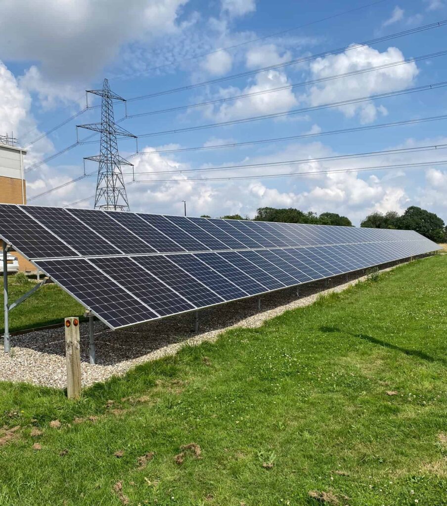 Commercial solar panel cleaning Hertfordshire A row of outdoor solar panels in Hertfordshire county, under contract by EV Solar