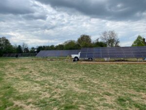 A progress update photo with EV Solar's pickup truck in the background