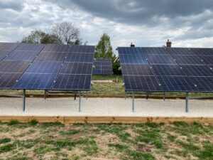 A close up view of the ground-mounted solar panels